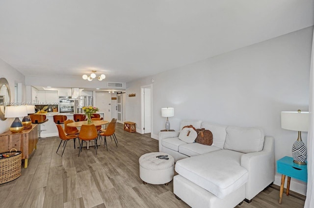 600 Three Islands Blvd Unit 615, Hallandale Beach, FL 33009 - living area with light wood-type flooring