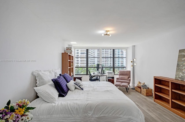 600 Three Islands Blvd Unit 615, Hallandale Beach, FL 33009 - bedroom featuring wood finished floors
