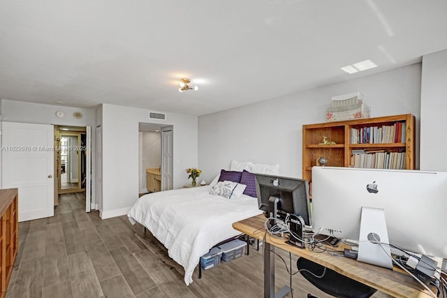 600 Three Islands Blvd Unit 615, Hallandale Beach, FL 33009 - bedroom featuring wood finished floors and a desk