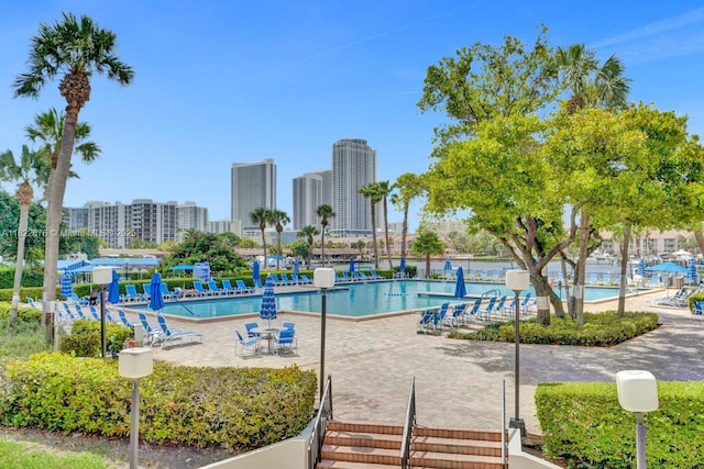 600 Three Islands Blvd Unit 615, Hallandale Beach, FL 33009 - community pool featuring a patio