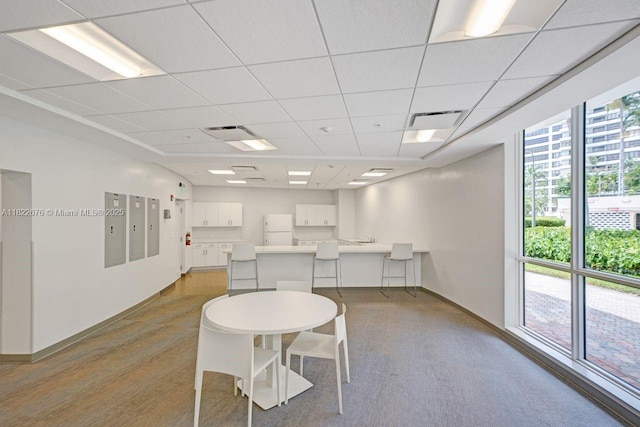 600 Three Islands Blvd Unit 615, Hallandale Beach, FL 33009 - dining space featuring a drop ceiling and light colored carpet