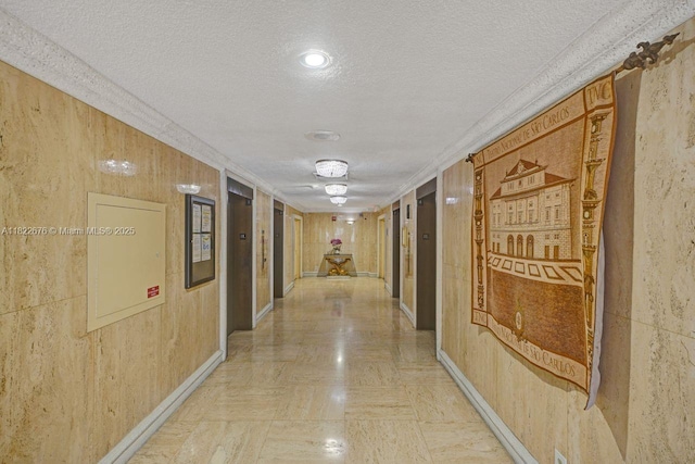 600 Three Islands Blvd Unit 615, Hallandale Beach, FL 33009 - corridor with a textured ceiling and crown molding