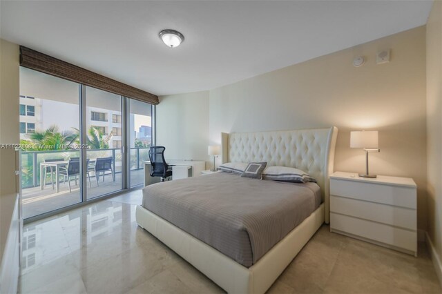 3101 S Ocean Dr Unit 404, Hollywood, FL 33019 - bedroom featuring a wall of windows and access to outside
