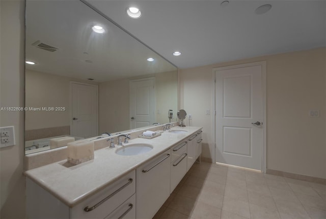 3101 S Ocean Dr Unit 404, Hollywood, FL 33019 - bathroom with double vanity, recessed lighting, and tile patterned flooring