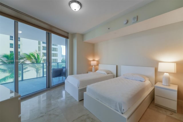3101 S Ocean Dr Unit 404, Hollywood, FL 33019 - bedroom featuring a wall of windows and access to outside