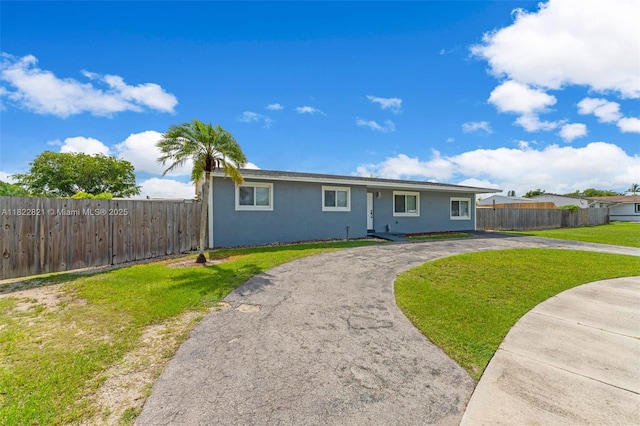 27645 SW 163rd Ave, Homestead, FL 33031 - single story home with stucco siding and curved driveway