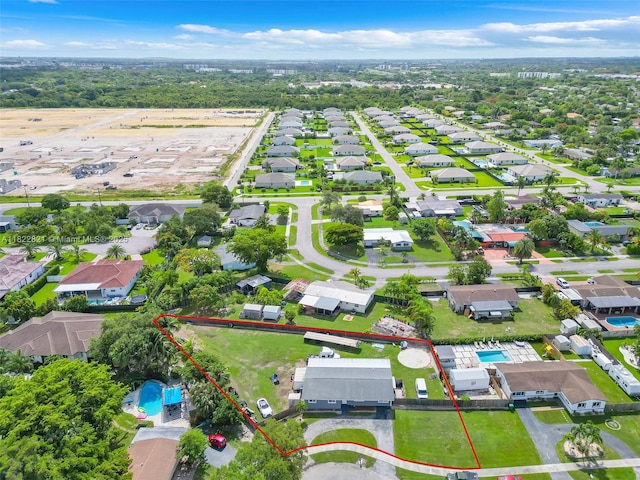27645 SW 163rd Ave, Homestead, FL 33031 - aerial view of residential area featuring property boundaries highlighted and a pool area