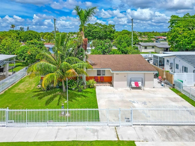 28540 SW 146th Ave, Homestead, FL 33033 - view of front of property featuring stucco siding, a fenced front yard, and concrete driveway