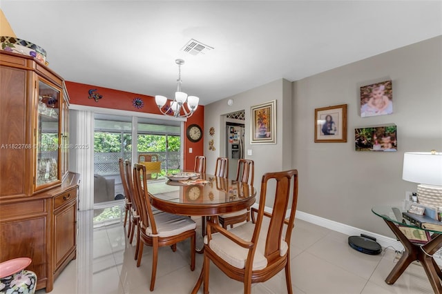 28540 SW 146th Ave, Homestead, FL 33033 - dining area with a chandelier and light tile patterned floors