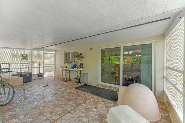 28540 SW 146th Ave, Homestead, FL 33033 - sunroom / solarium with a chandelier
