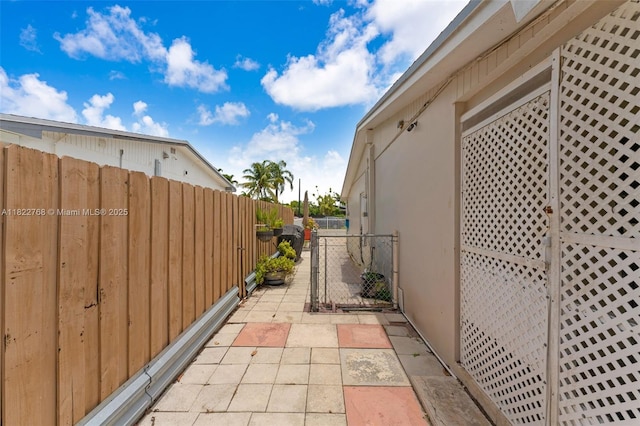 28540 SW 146th Ave, Homestead, FL 33033 - view of property exterior with stucco siding and a gate