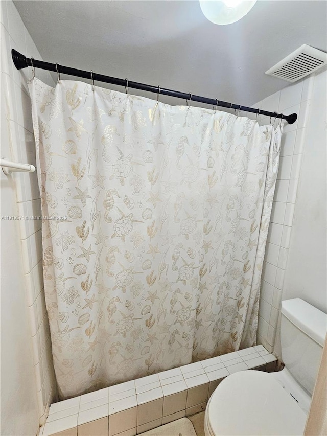 8401 W Sample Rd Unit 10, Coral Springs, FL 33065 - bathroom with toilet and a shower with curtain