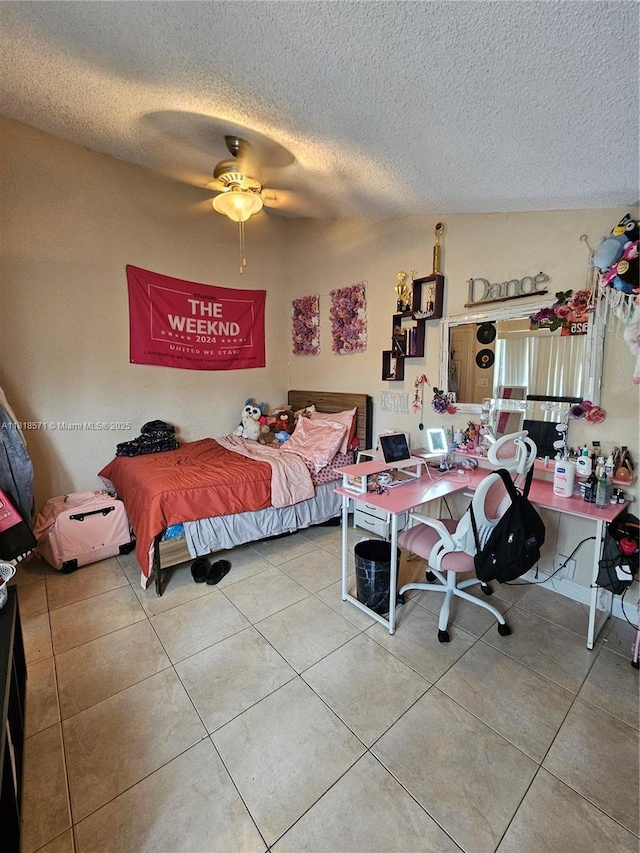8401 W Sample Rd Unit 10, Coral Springs, FL 33065 - bedroom with a textured ceiling, tile patterned floors, an office area, and ceiling fan