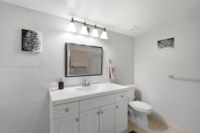 100 Golden Isles Dr Unit 101, Hallandale Beach, FL 33009 - bathroom with toilet and vanity