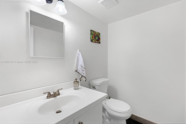 100 Golden Isles Dr Unit 101, Hallandale Beach, FL 33009 - half bathroom with toilet and vanity