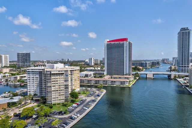 100 Golden Isles Dr Unit 101, Hallandale Beach, FL 33009 - water view with a notable bridge and nearby urban area