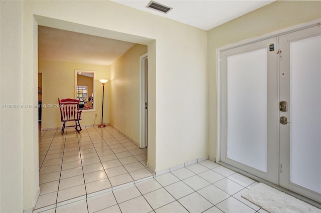 7950 NW 174th Ter, Hialeah, FL 33015 - hallway with light tile patterned flooring