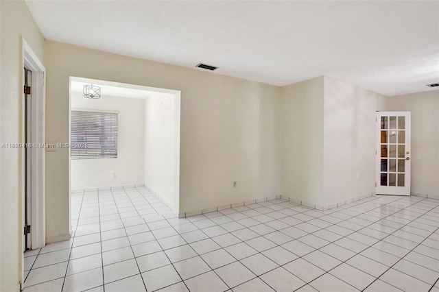 7950 NW 174th Ter, Hialeah, FL 33015 - spare room featuring light tile patterned floors