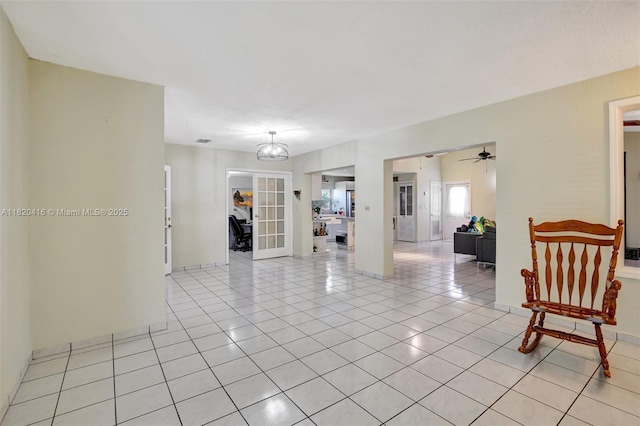 7950 NW 174th Ter, Hialeah, FL 33015 - living area featuring light tile patterned floors and ceiling fan