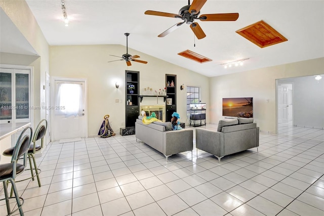 7950 NW 174th Ter, Hialeah, FL 33015 - living room featuring light tile patterned floors, a ceiling fan, lofted ceiling, and track lighting