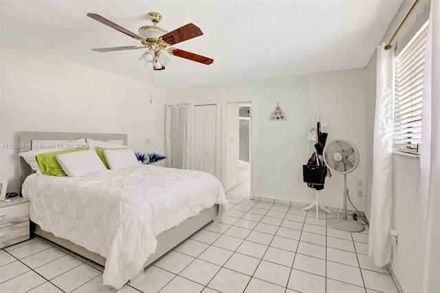 7950 NW 174th Ter, Hialeah, FL 33015 - bedroom with light tile patterned floors and ceiling fan