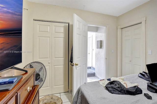 7950 NW 174th Ter, Hialeah, FL 33015 - bedroom with light tile patterned floors and a closet