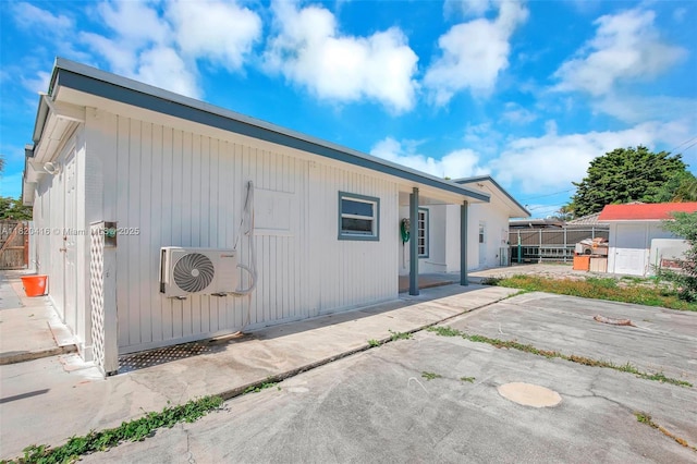 7950 NW 174th Ter, Hialeah, FL 33015 - rear view of house featuring a patio area