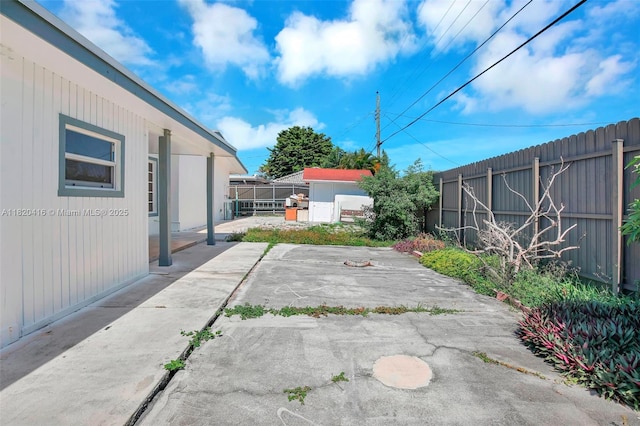 7950 NW 174th Ter, Hialeah, FL 33015 - fenced backyard with a patio area