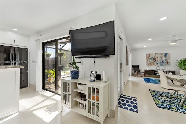 2571 NW 99th Ave, Coral Springs, FL 33065 - living room with recessed lighting, a ceiling fan, and light tile patterned floors