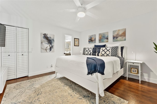 2571 NW 99th Ave, Coral Springs, FL 33065 - bedroom featuring dark wood-style flooring, ensuite bathroom, a ceiling fan, and a closet