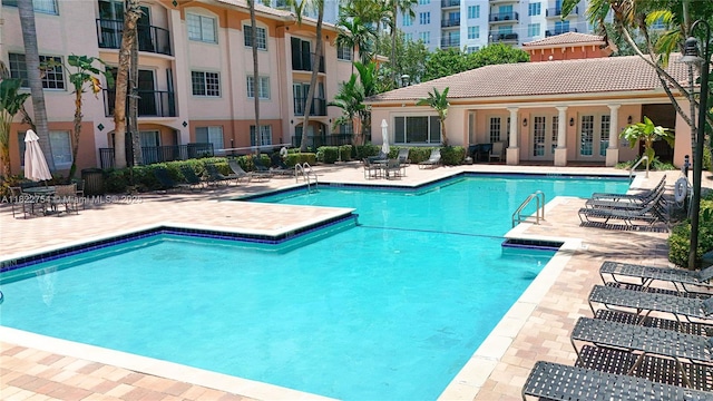 2015 SE 10th Ave Unit 123, Fort Lauderdale, FL 33316 - community pool with a patio and french doors