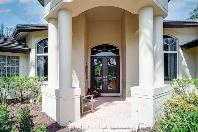 6807 NW 66th Way, Parkland, FL 33067 - entrance to property with french doors and stucco siding