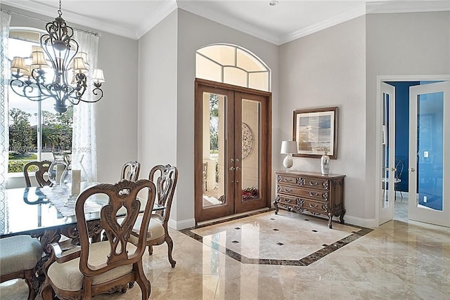 6807 NW 66th Way, Parkland, FL 33067 - entrance foyer featuring french doors, marble tiled floors, a chandelier, plenty of natural light, and crown molding