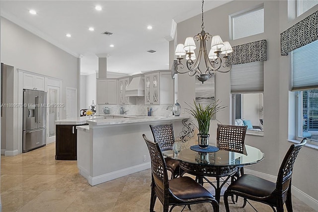 6807 NW 66th Way, Parkland, FL 33067 - dining area with a chandelier, recessed lighting, and ornamental molding