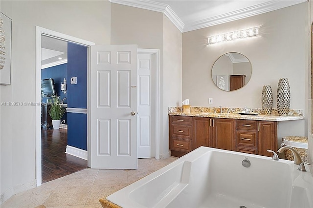 6807 NW 66th Way, Parkland, FL 33067 - bathroom featuring crown molding, vanity, and a bath