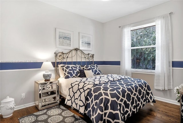 6807 NW 66th Way, Parkland, FL 33067 - bedroom featuring wood finished floors and baseboards