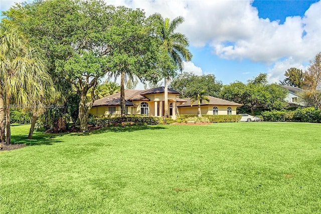 6807 NW 66th Way, Parkland, FL 33067 - view of grassy yard