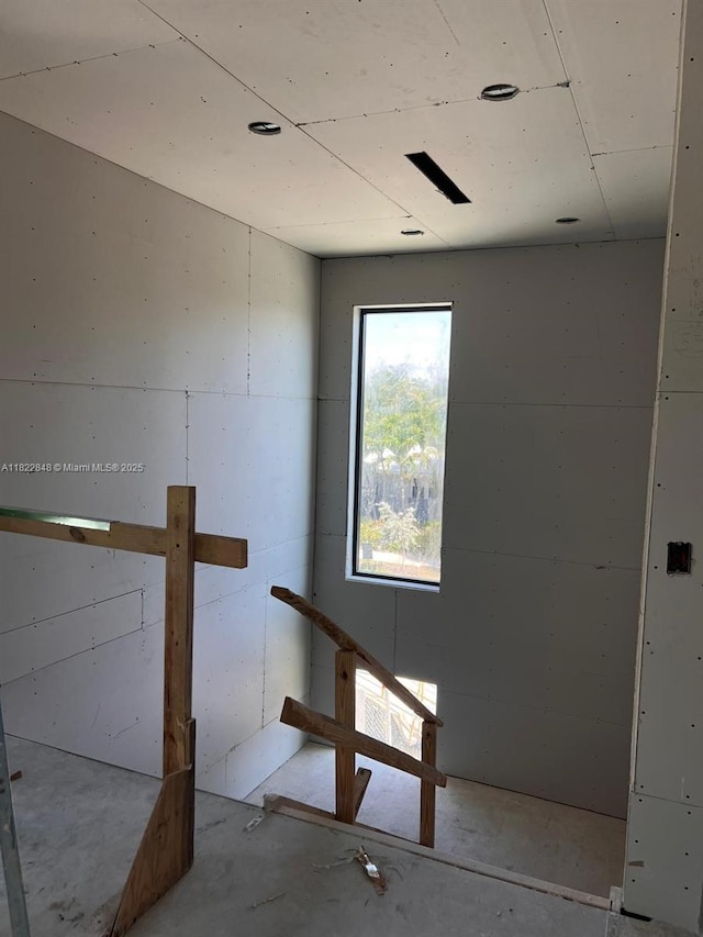 1700 NE 18th St, Fort Lauderdale, FL 33305 - spare room featuring unfinished concrete flooring