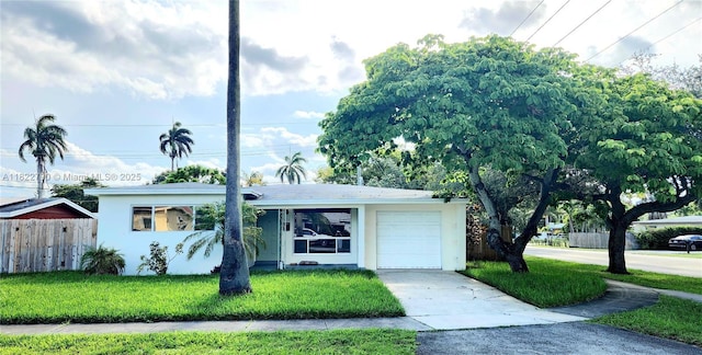 826 N 32nd Ct, Hollywood, FL 33021 - ranch-style home featuring concrete driveway, stucco siding, and a garage
