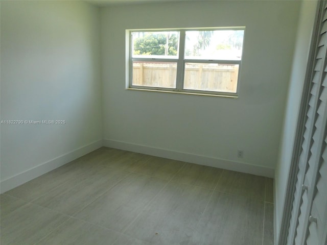 826 N 32nd Ct, Hollywood, FL 33021 - empty room with healthy amount of natural light