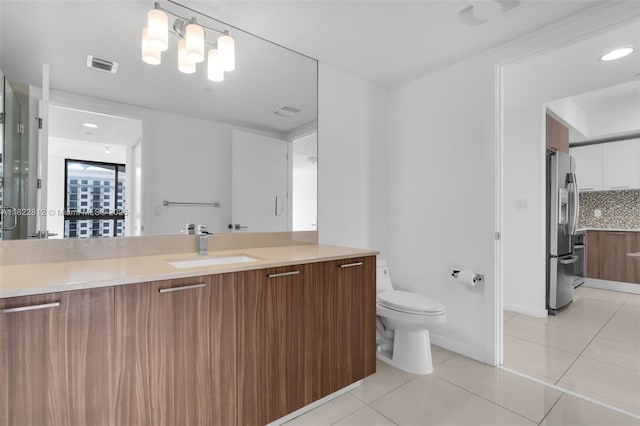5252 NW 85th Ave Unit 1505, Doral, FL 33166 - bathroom with vanity, tile patterned floors, and recessed lighting