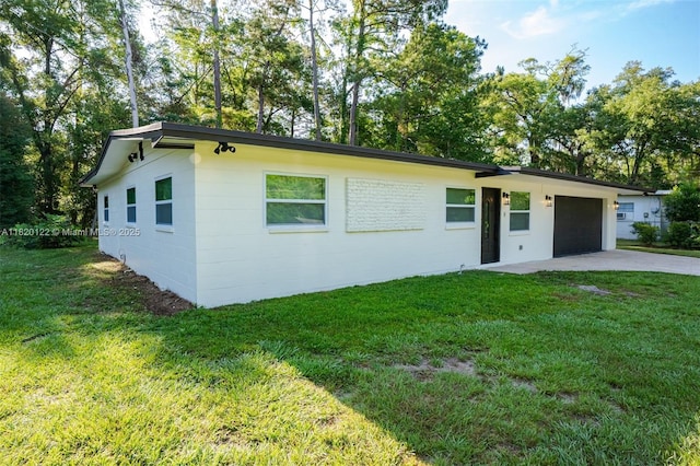 3313 N Ridge Rd, Tallahassee, FL 32305 - view of front of house with a garage, driveway, and a front lawn
