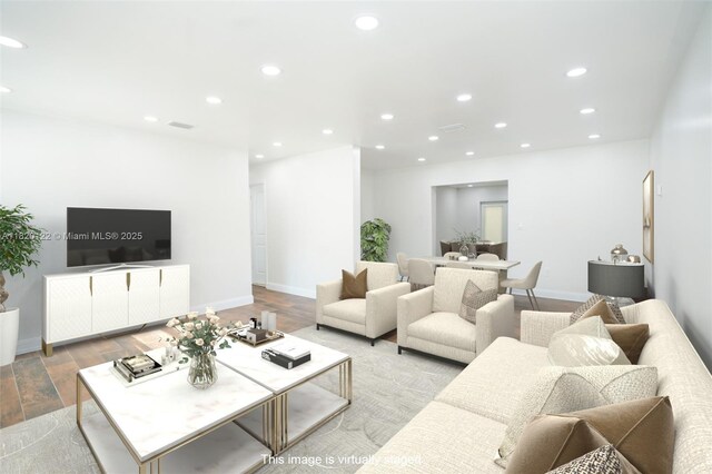 3313 N Ridge Rd, Tallahassee, FL 32305 - living room featuring wood finished floors and recessed lighting