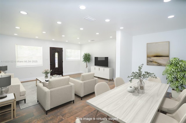 3313 N Ridge Rd, Tallahassee, FL 32305 - living room featuring dark wood-type flooring and recessed lighting