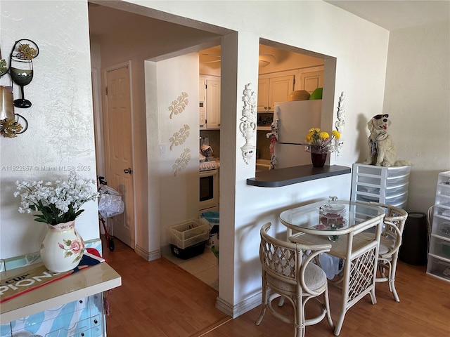 851 Atlantic Shores Blvd Unit 118, Hallandale Beach, FL 33009 - dining area with wood finished floors