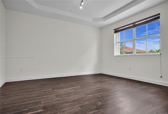 3086 SW 153rd Path, Miami, FL 33185 - unfurnished room featuring a raised ceiling and dark wood finished floors