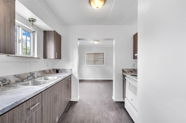 2135 NW 154th St, Miami Gardens, FL 33054 - kitchen featuring dark wood-type flooring, white range with electric cooktop, and light countertops