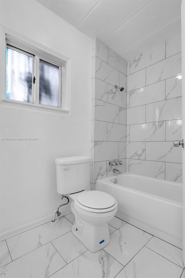 2135 NW 154th St, Miami Gardens, FL 33054 - full bath with marble finish flooring and shower / bath combination