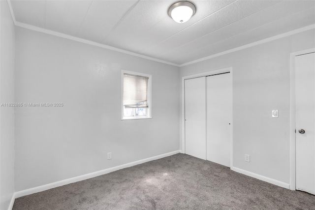 2135 NW 154th St, Miami Gardens, FL 33054 - unfurnished bedroom featuring crown molding, carpet, and a closet