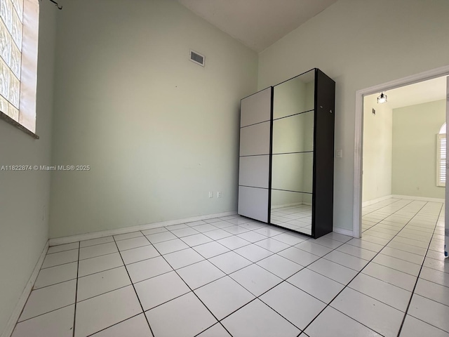 3461 SW 154th Ct, Miami, FL 33185 - unfurnished bedroom with light tile patterned flooring and baseboards